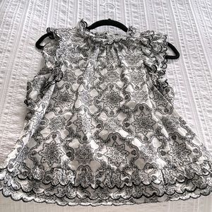 Black and white 100% cotton, sleeveless blouse from Anthropology.